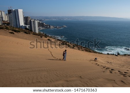 Sandboarding next to Concon, Chile Royalty-Free Stock Photo #1471670363