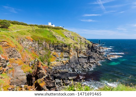 Lizard Lighthouse  with Polbream Cove below. Cornwall England UK Europe