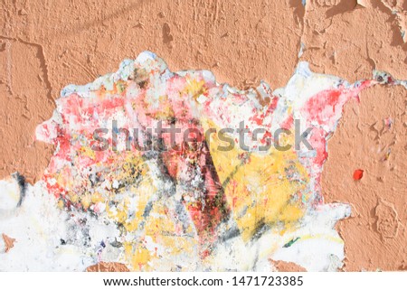 Old red wall of plaster, great for design and texture background.