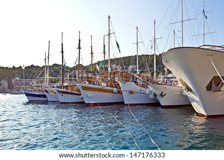 Row Of New Luxury Yachts. High quality stock photo.