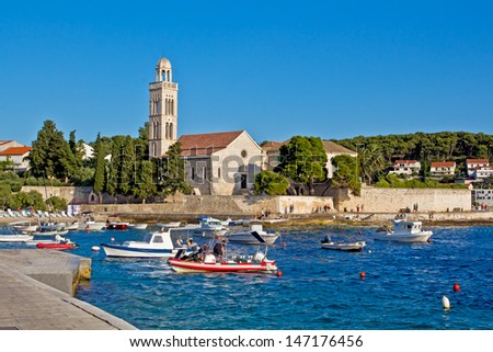 European City Scape. Bay, Boat, Mountain, Sea and Sky. Hvar. Croatia. High quality stock photo.