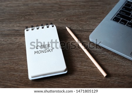 cyber Monday text With pencil and laptop computer,Business concept.