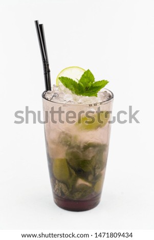 Classic cuban mojito with rum, lime juice, cane sugar, soda water and a bunch of mint isolated on white background