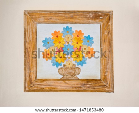 Picture frame of flowers made in wood
