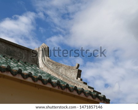 Rooftop ancient Chinese architecture on sky background. 