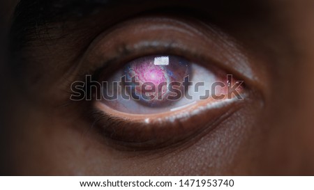 close up of a man's eyes with a galaxy inside his iris  Royalty-Free Stock Photo #1471953740