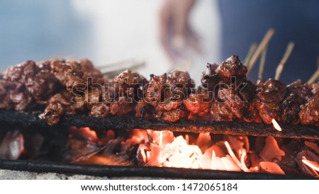the process of making a typical satay lombok, Indonesia Royalty-Free Stock Photo #1472065184
