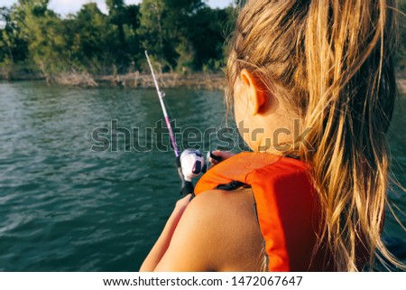 Family fishing trip on a boat