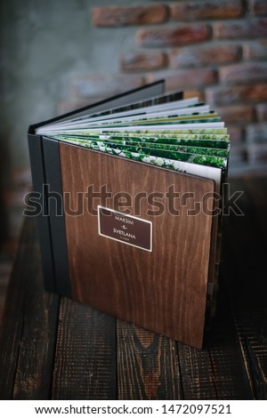 
premium photo book, large size, natural wood cover with metal nameplate, wedding photo book, family photo book, thick sheets, quality binding