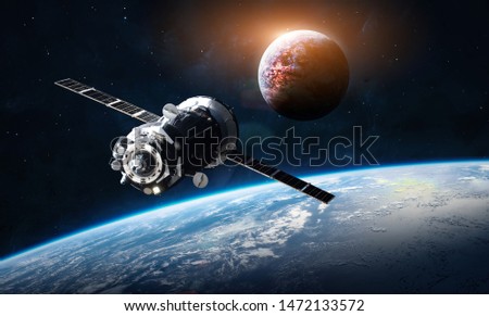 Earth, Mars and space ship in the solar system. Technology and civilization. Colonization. Elements of this image furnished by NASA