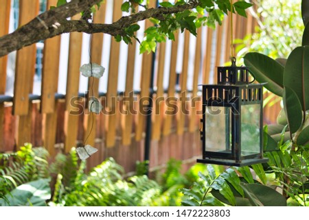 Small lamp in inner courtyard. Royalty-Free Stock Photo #1472223803