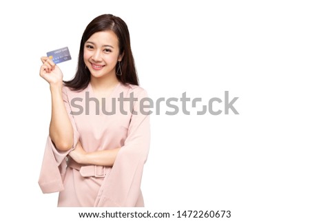 Happy Asian woman holding credit card or cash advances, Pay instead of money and specially curated benefits for lady card concept