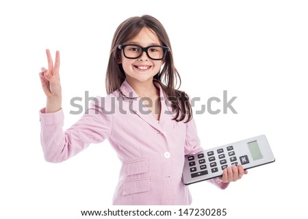 Young girl counting a calculator and holding up two fingers. Isolated on white background.