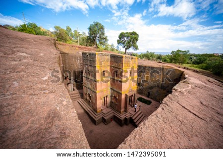The Church of Saint George (Amharic: Bete Giyorgis) is one of eleven rock-hewn monolithic churches in Lalibela, a city in the Amhara Region of Ethiopia. Royalty-Free Stock Photo #1472395091