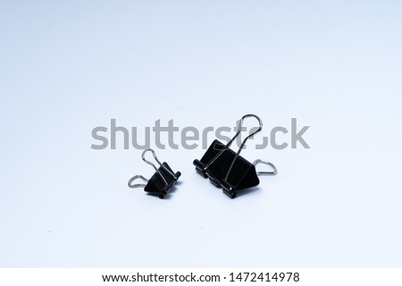Mini paper clip isolated on white background