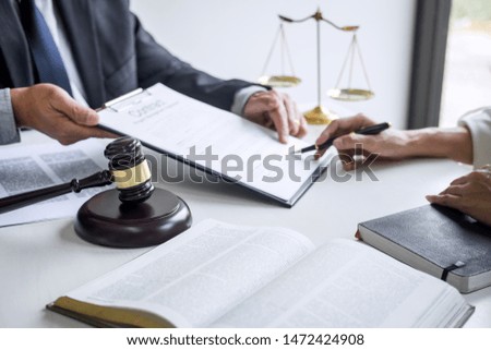 Businesswoman and Male lawyer or judge consult and conference having team meeting with client at law firm in office, Law and Legal services concept.