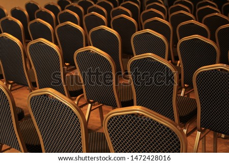 The back of the chairs in the auditorium
