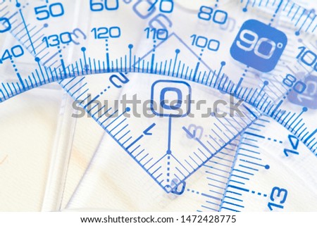 Plastic rulers on the white background