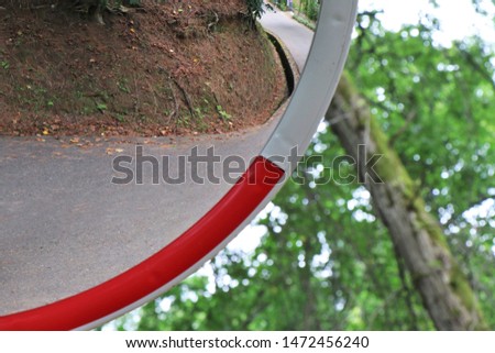 Road mirror, located in a dangerous mountain curve.