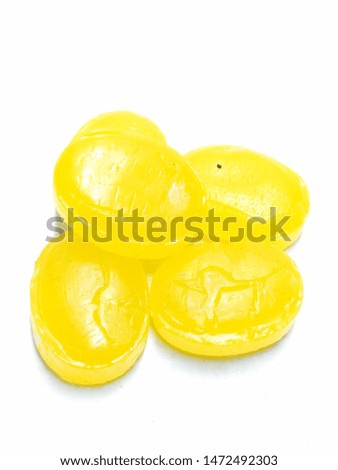 A portrait picture of mango candy's on white background