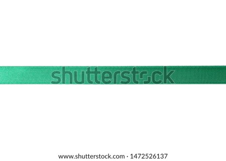 Green ribbon isolated on white background. Gift concept