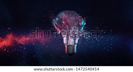 explosion of a filament electric bulb at the moment of impact. high speed photography. Royalty-Free Stock Photo #1472540414