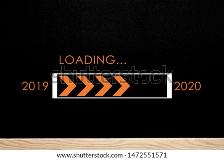 2019 2020 loading with progress bar, chalk drawing on blackboard