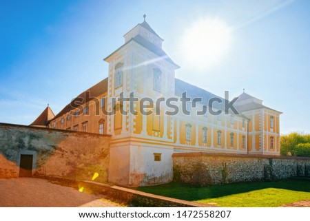 Medieval castle at Old center in Slovenska Bistrica near Maribor in Slovenia. Fortress in City travel in South Styria in Slovenija. Yellow Fort in Slovenian town. Blue sky and sunny day.