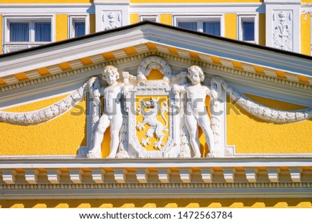 Decor at Hotel building in Old city in Rogaska Slatina in Slovenia in South Styria. Travel in Europe Slovenian luxury spa resort. Summer view. Town destination. Yellow decoration of architecture