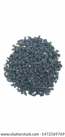 A portrait picture of black seed's on white background