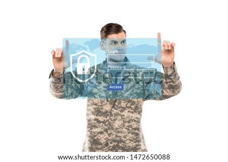 handsome man in military uniform pointing with fingers near virtual padlock with lettering on white 