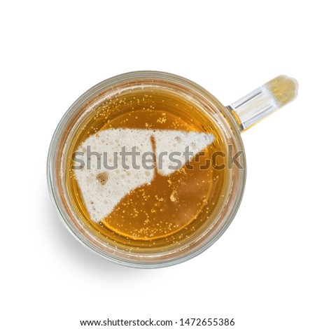 Sign human liver on the beer foam in glass isolated on white background. Top view. Harm of alcohol concept.
