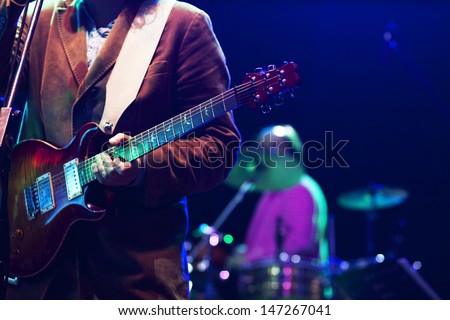 Guitarist on stage Royalty-Free Stock Photo #147267041