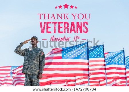 patriotic soldier in military uniform giving salute near american flags with stars and stripes with thank you veterans illustration