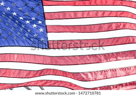 The American Flag waving in the wind.
