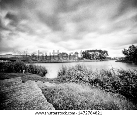 River Erne and Enniskillen Castle in the summer, Co. Fermanagh, Northern Ireland. This black and white camera obscura photo is NOT sharp due to camera characteristic