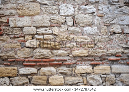 
background in the form of a stone old wall of large blocks