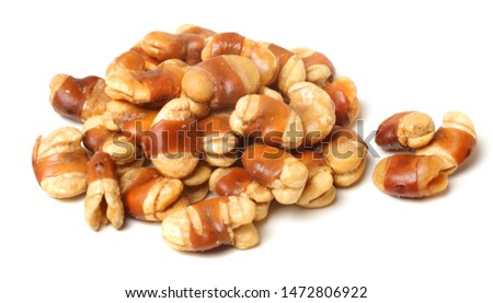 Roasted salted broad beans whith shell on white background stock photo