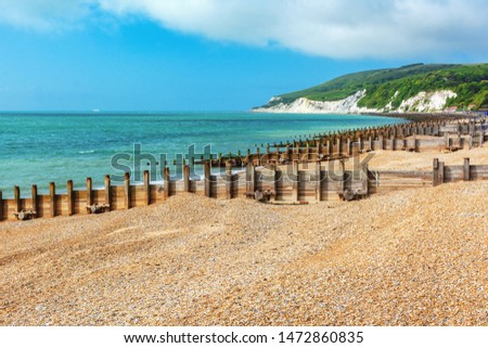 Walk to Holywell beach in Eastbourne, East Sussex, England, view of the sea, cliffs, groynes, selective focus Royalty-Free Stock Photo #1472860835