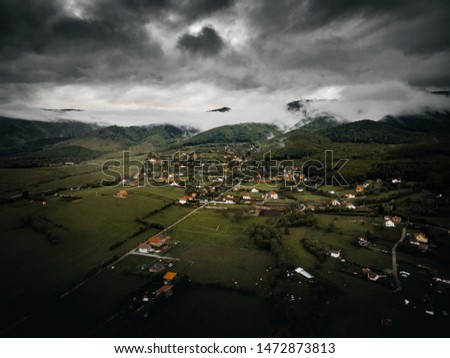 Aerial view with an old village in the rural area, Romania