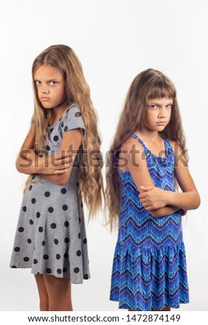 Two sisters are at enmity Royalty-Free Stock Photo #1472874149