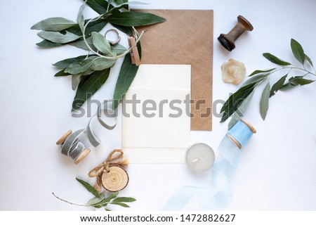 wedding invitation card with leaves and details