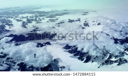 Aerial picture of the arctic part of Greenland showing melting ice due to the global warming effect