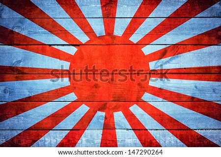 Japan flag on the old wooden background