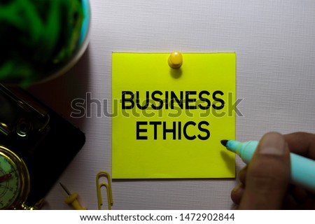 Business Ethics text on sticky notes isolated on office desk