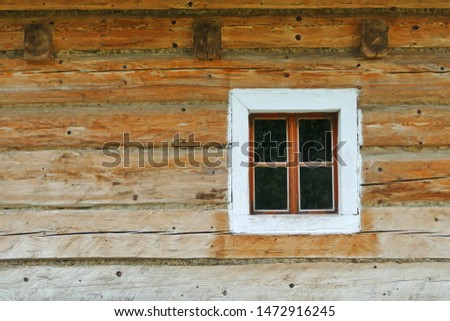 Detail of historic wooden window of old farming house