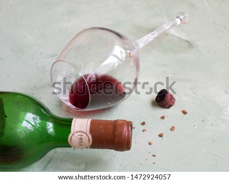 Sediment in a glass of old wine. Sediment in wine.