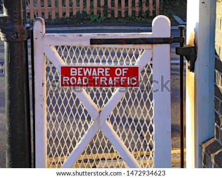 Pedestrian gate next to the level crossing at Blue Anchor station on the West Somerset heritage railway.