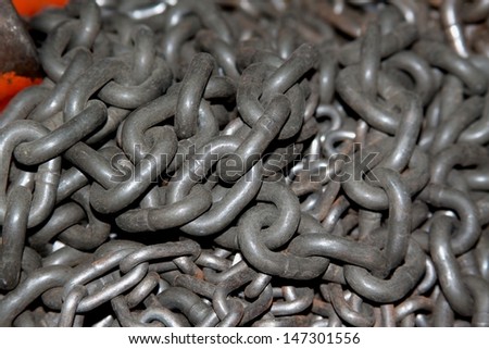 Abstract of Thick Rusty Chain Background Image with Vignette.