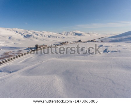 Aerial view of ski resorts and untouched snow in the morning